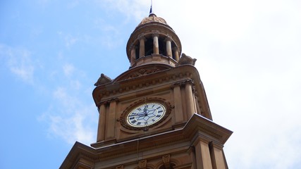 Fototapeta na wymiar old clock on the tower