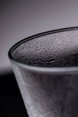 Obraz na płótnie Canvas Drops of water on a transparent glass.