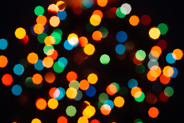 Christmas garland blurred lights. Background with abstract and colorful bokeh .
