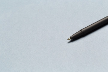 Ballpoint pen showing communication contact us or mail concept on gray background