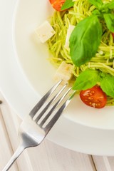 pasta with tomatoes, spinach and parma ham