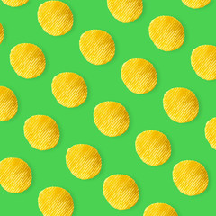 Potato chips pattern on pastel green background top view flat lay