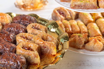 Traditional eastern arabic dessert Baklava with Turkish honey and walnuts, selective focus. Copy space