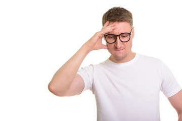 Handsome Caucasian man isolated against white background