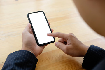 Businessman using mockup smartphone on hands.