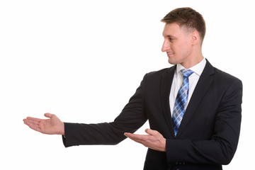 Handsome Caucasian man isolated against white background