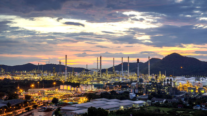 Beautiful sunset  petrochemical oil refinery factory plant cityscape of Chonburi province at night on 2017 , landscape Thailand