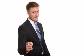 Handsome Caucasian man isolated against white background