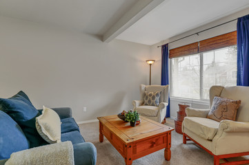 Open sunny space with living room interior