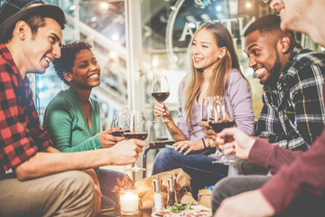 Young trendy friends drinking red wine inside fashion winery bar - obrazy, fototapety, plakaty