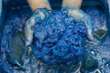 Process dye fabric indigo color in Phare Thailand.