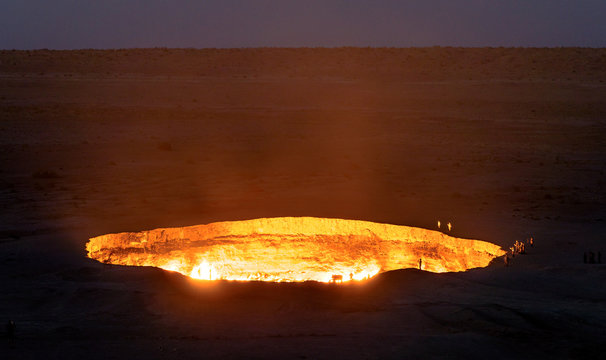 Turkmenistan gates of hell gas crater fire in Karakum desert near Darvaza. Burning methane gas crater in Derweze in Karakum desert. Door to hell in Turkmenistan.