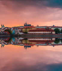 Beautiful view over Prague Castle and old town with a reflection in Vltava river in Prague, Czech Republic