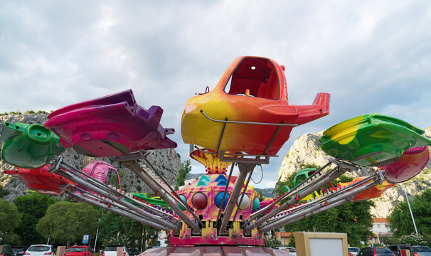 Colorful carousel in the amusement park.