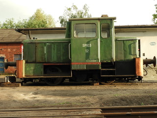 the locomotive, a monument, a train, a metal, green