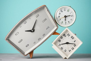 Fototapeta na wymiar Retro alarm clocks stack time concept