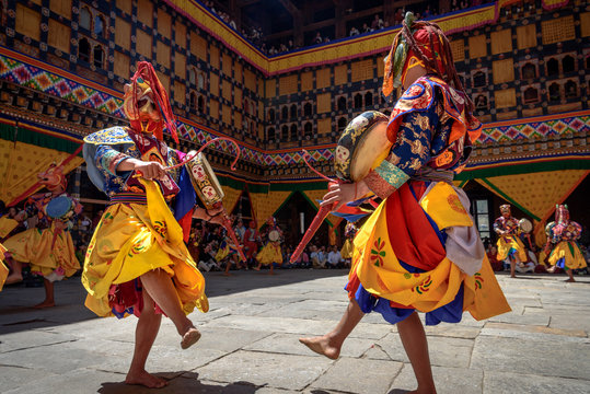 Bhutan Monk dancing for colorful mask dance at yearly Paro Tsechu festival in Bhutan
