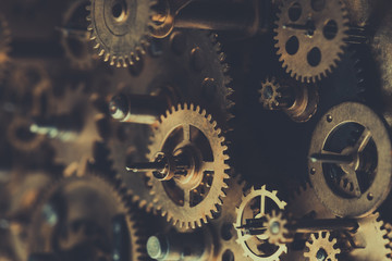 Vintage mechanism with gears and cogs retro toned