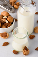 Organic almond milk with almonds and nutcracker
