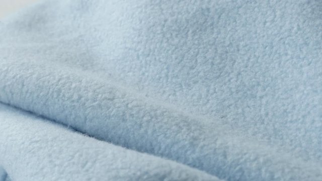 Finest polar fleece blanket close-up 4K panning footage