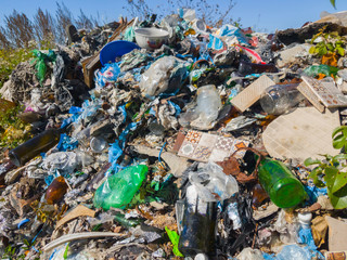  The garbage dump in nature, close up /	Construction garbage, plastic garbage, close up, focus on foreground