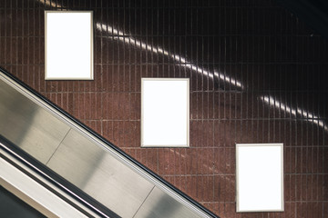 Three white blank spaces for advertisement on wall. Subway mock-up design. Horizontal