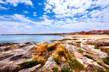 Fototapeta na wymiar Landscape with sea,cliff, beach and blue sky. Galicia Spain.