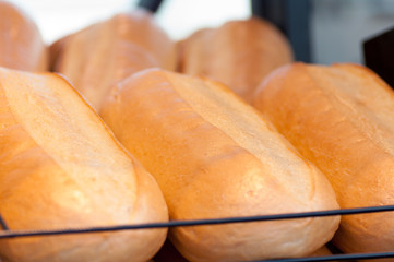 a loaf of bread is on the shelves at the bakery