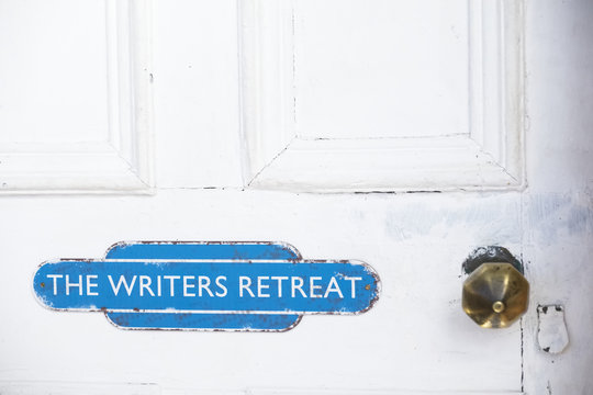 Writers Retreat Door Sign At Entrance To Quiet Room On White Weather Oak Door Distressed Paint