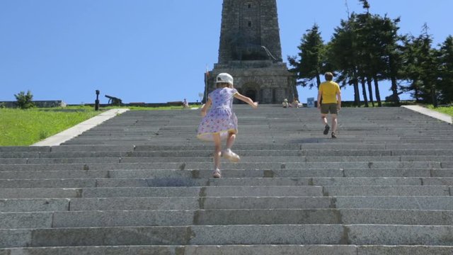 Tourists going upstairs to monument