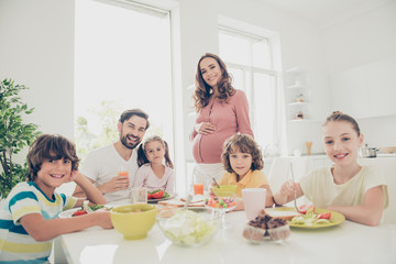 Low angle view of big nice beautiful excited cheerful joyful fam