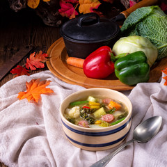 delicious autumnal vegetable soup with sausage and bacon