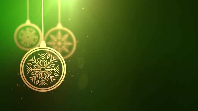 Golden moving bauble ball falling down Christmas new year festive seasonal celebration placeholder green background