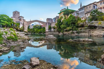 Tableaux sur verre Stari Most Stari Most Bridge at sunrise in Mostar, Bosnia and Herzegovina. Beautiful old ancient bridge to protect the historic city