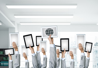 Close of businessman hands in line showing tablet pc with blank 