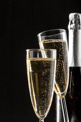 glasses of champagne with the bottle