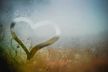 Heart on the misted window