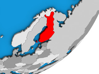 Finland on blue political 3D globe.