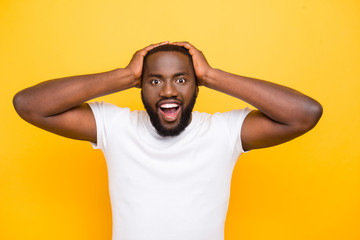 Handsome attractive manly sportive cheerful crazy bearded mulato