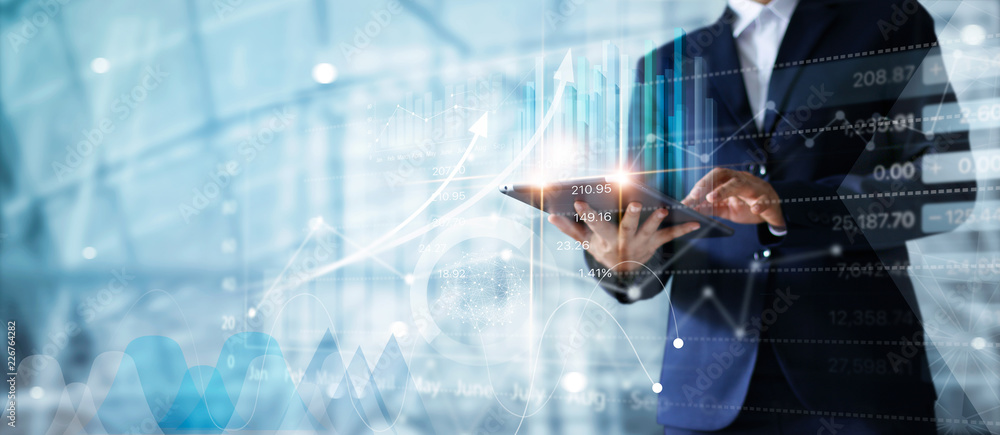Aufkleber businessman using tablet analyzing sales data and economic growth graph chart. business strategy. ab