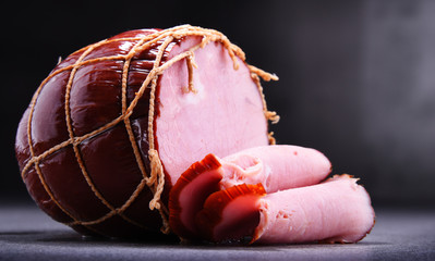 Composition with piece of ham. Meatworks products