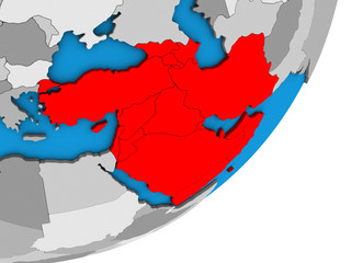 Western Asia on blue political 3D globe.