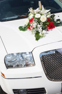 wedding bouquet on limo car in marriage day