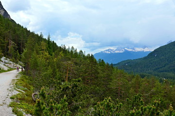 Obraz premium Italian Alps -cyclists on the cycle path in Dolomites
