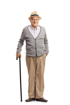 Senior man standing with a cane