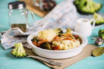 baked cauliflower and broccoli with cheese on a plate