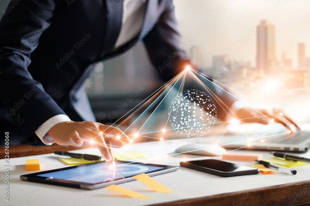 Poster Businessman touching tablet and laptop. Managing global structure networking and data exchanges customer connection on workplace. Business technology and digital marketing.