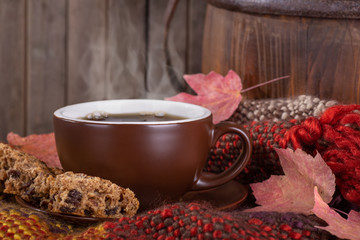 Steaming Cup of Coffee and Raisin Cookie