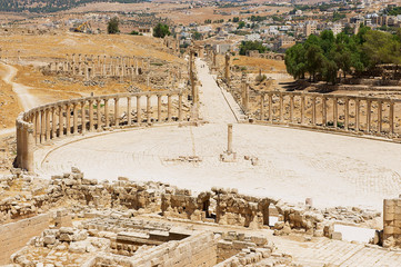 Ruins of Forum (Oval Plaza) and Colonnade street in Jerash, Jordan.