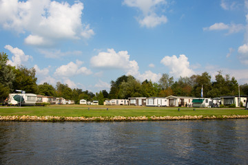 Caravan park at the waterfront in Friesland, the Netherlands.